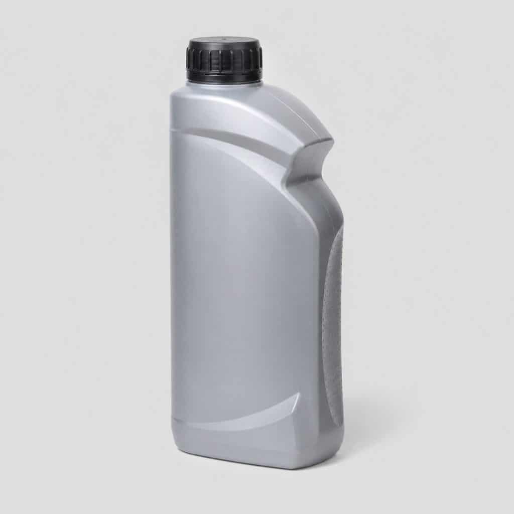 Flacon de nettoyant concentré pour FAP et turbo sur fond clair
